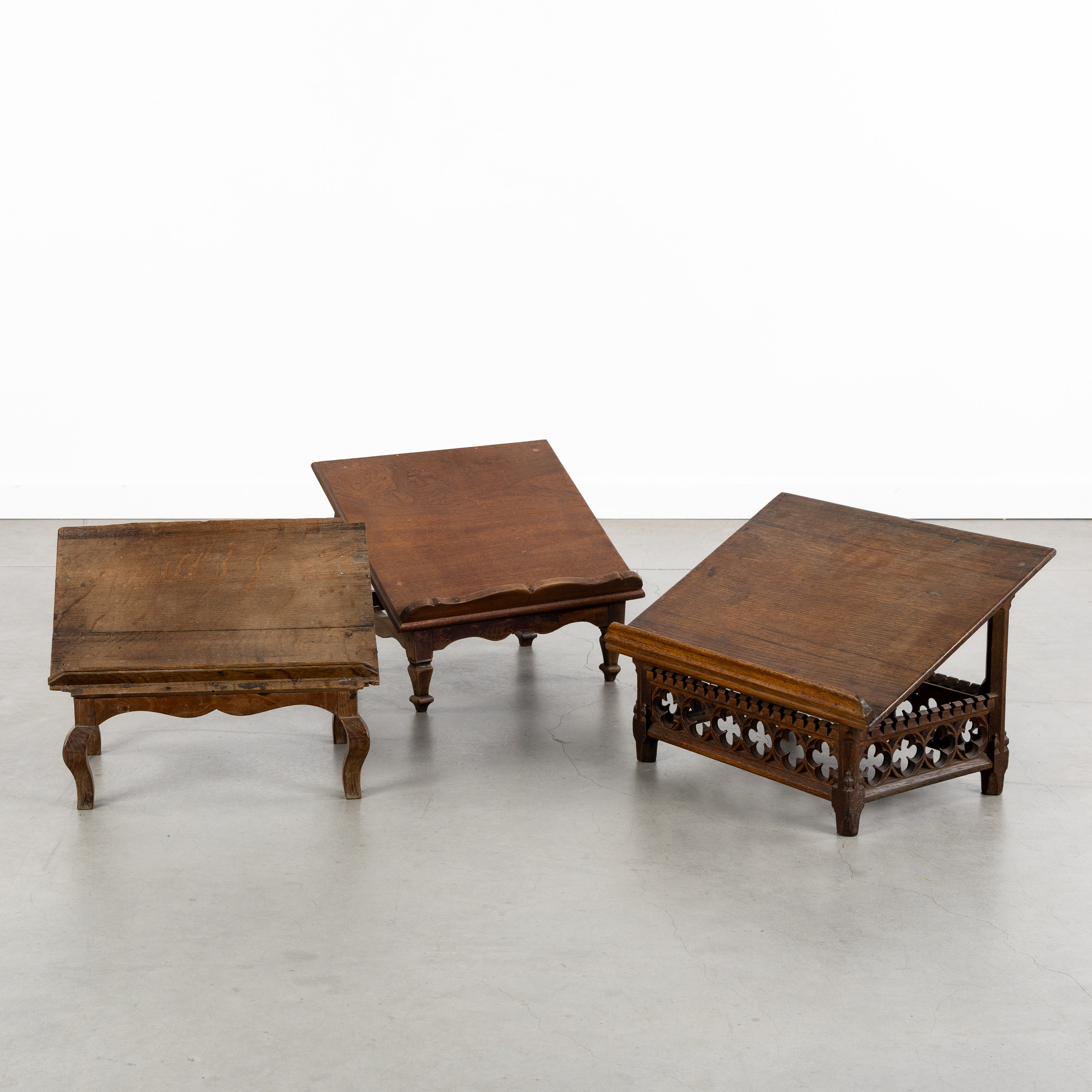 Three lecterns, sculptured wood, Gothic Revival, Louis XV and Louis XVI style. (L:47.5 x W:33 x H:32 cm)